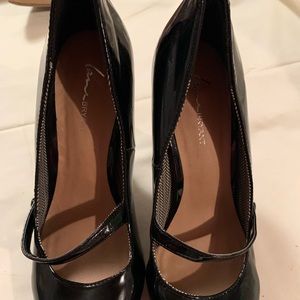 Black, shinny patent leather heels